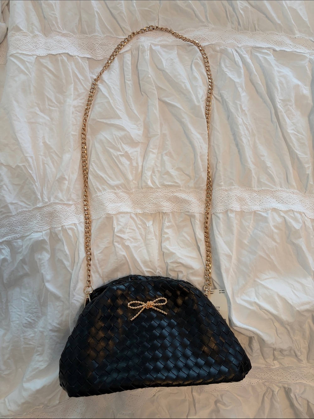 Maeve Black Woven Crossbody with Gold Chain and Bow